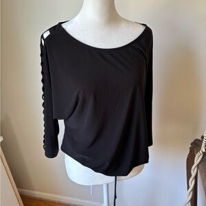 Black shirt with open arm design